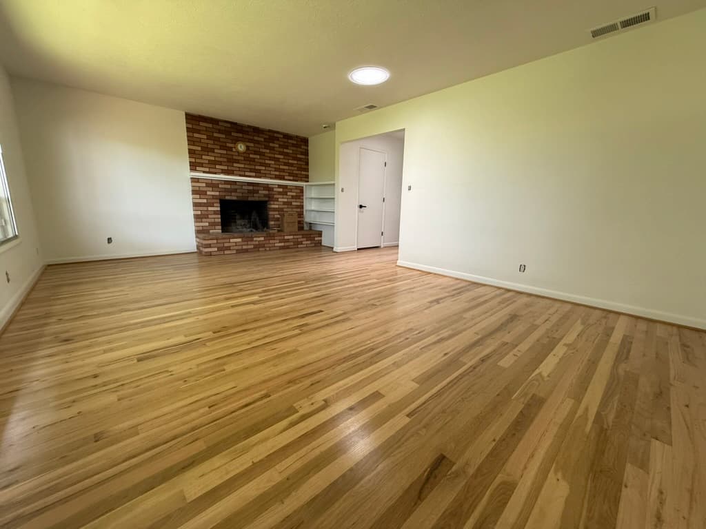 Wide-plank hardwood floor installation by Regal Hardwood Floors — Stoneway project Portland